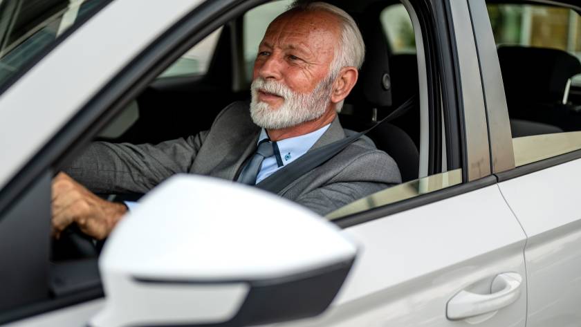 senior businessman driving a modern car in the cit 2025 09 28 05 47 01 utc