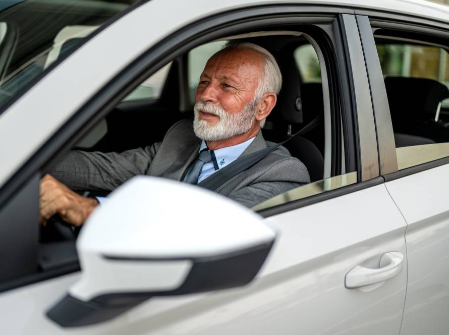 senior businessman driving a modern car in the cit 2025 09 28 05 47 01 utc