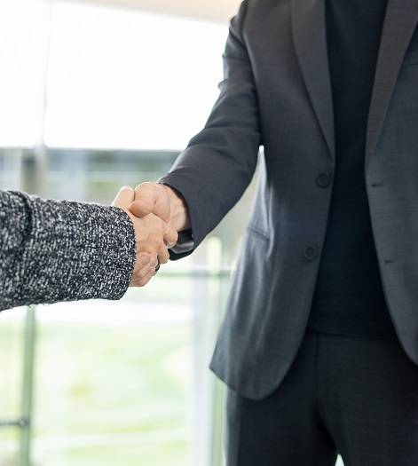 elegant mature businessman greeting his new collea 2025 03 14 02 54 11 utc